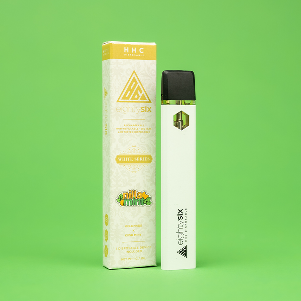 12 Nilla Mint HHC Disposable with its respective box on a green background.
