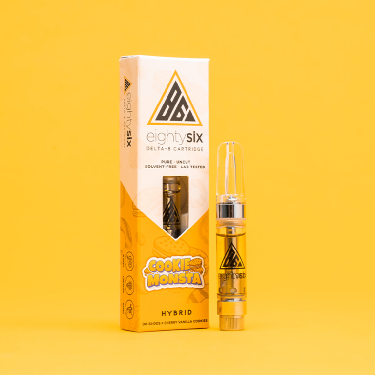 Cookie Monsta Delta-8 THC Vape Cartridge with its respective box on a yellow background.