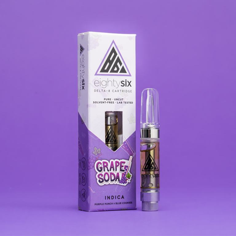 Grape Soda Delta-8 THC Vape Cartridge with its respective box on a purple background.