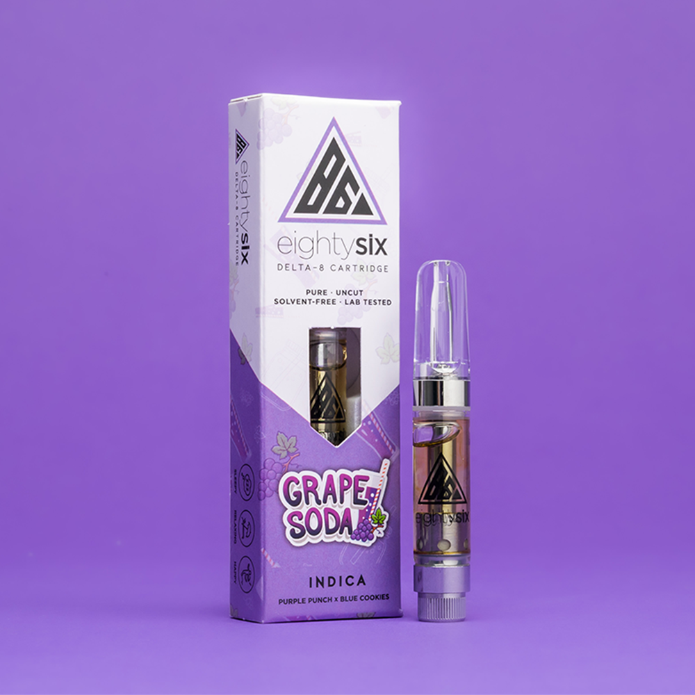 23 Grape Soda Delta-8 THC Vape Cartridge with its respective box on a purple background.