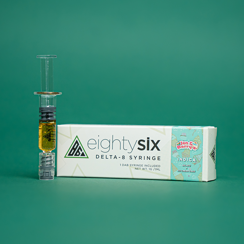 27 Jen & Berry's Delta-8 THC Syringe with its respective box on a green background.