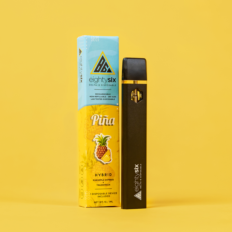 Piña Delta-8 THC Disposable with its respective box on a yellow background.