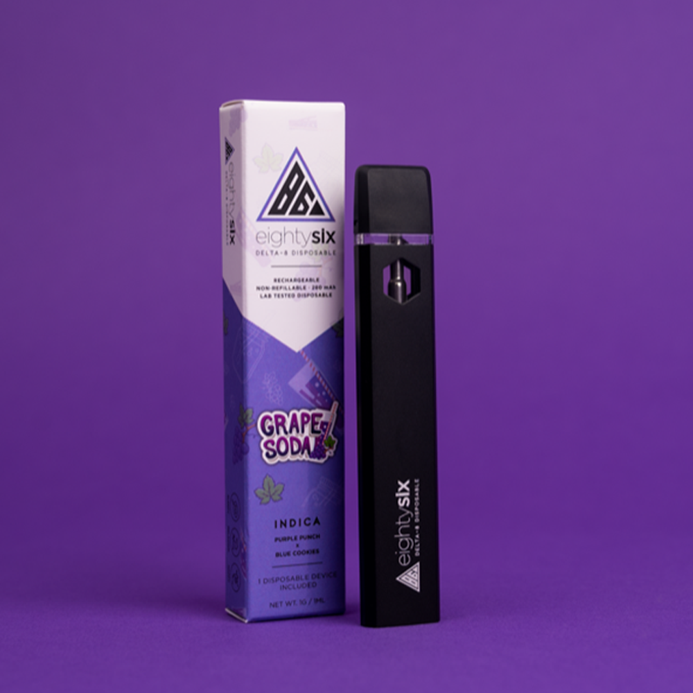 4 Grape Soda Delta-8 THC Disposable with its respective box on a purple background.
