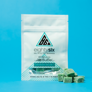 Midnight Melon Delta-8 THC Gummies with its respective mylar bag on a blue background.