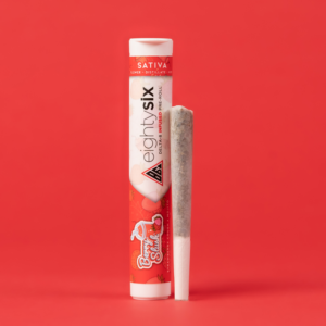 Berry Slush Delta-8 THC Pre-Roll with its respective packaging on a red background.
