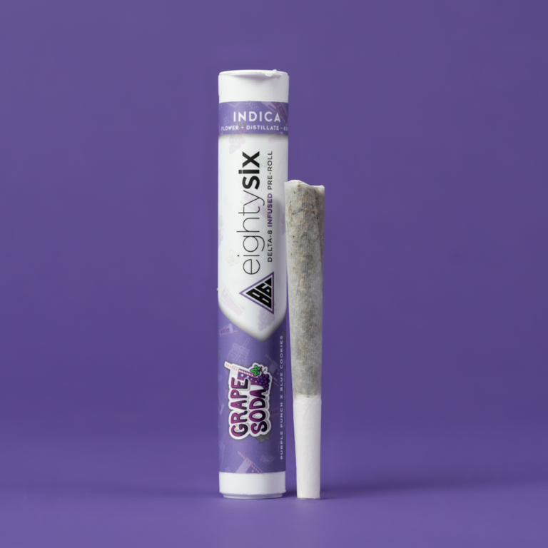 Grape Soda Delta-8 THC Pre-Roll with its respective packaging on a purple background.