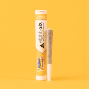 Piña Express Delta-8 THC Pre-Roll with its respective packaging on a yellow background.
